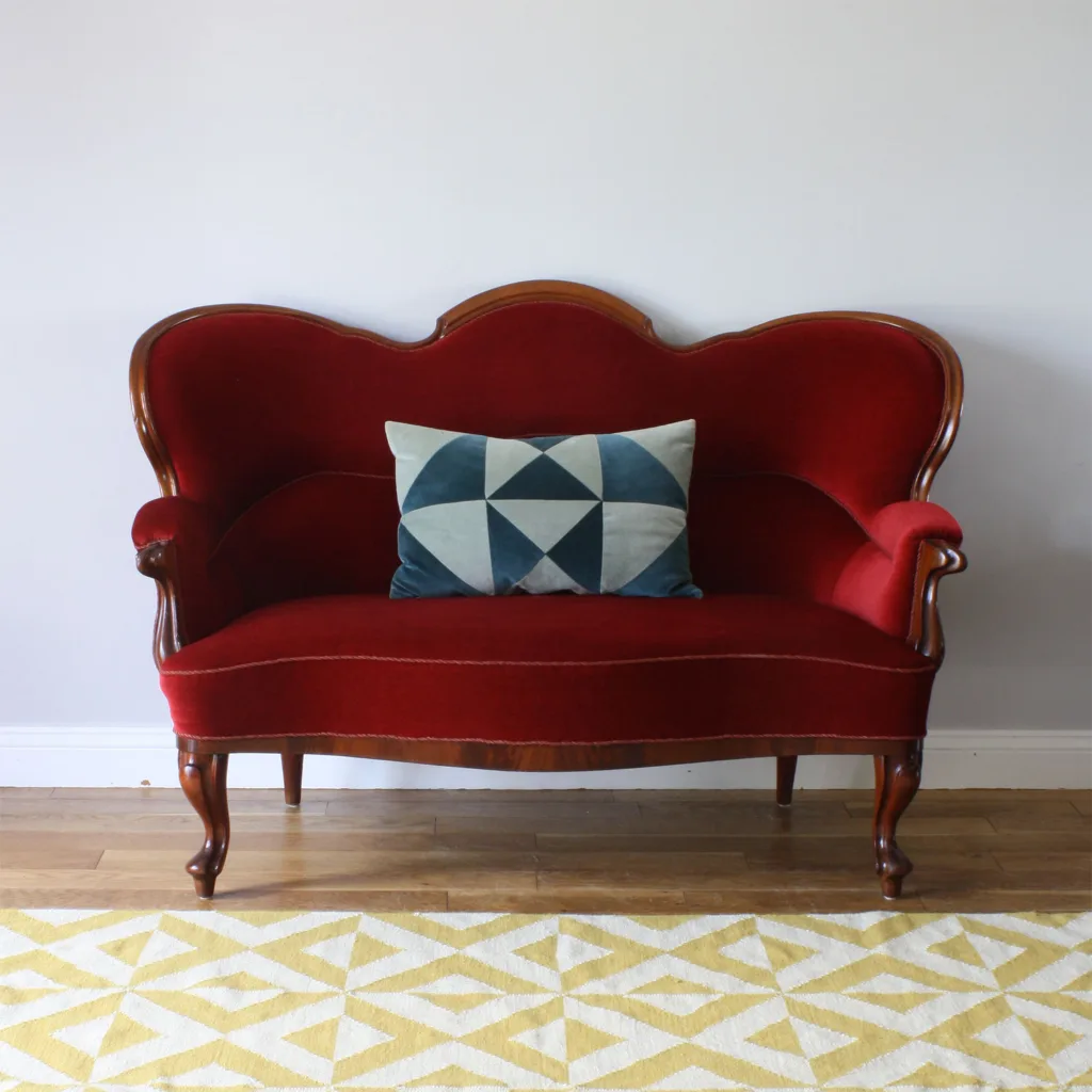 Early Midcentury Danish Red Velvet Two Seater Sofa with Ornate Wooden Frame