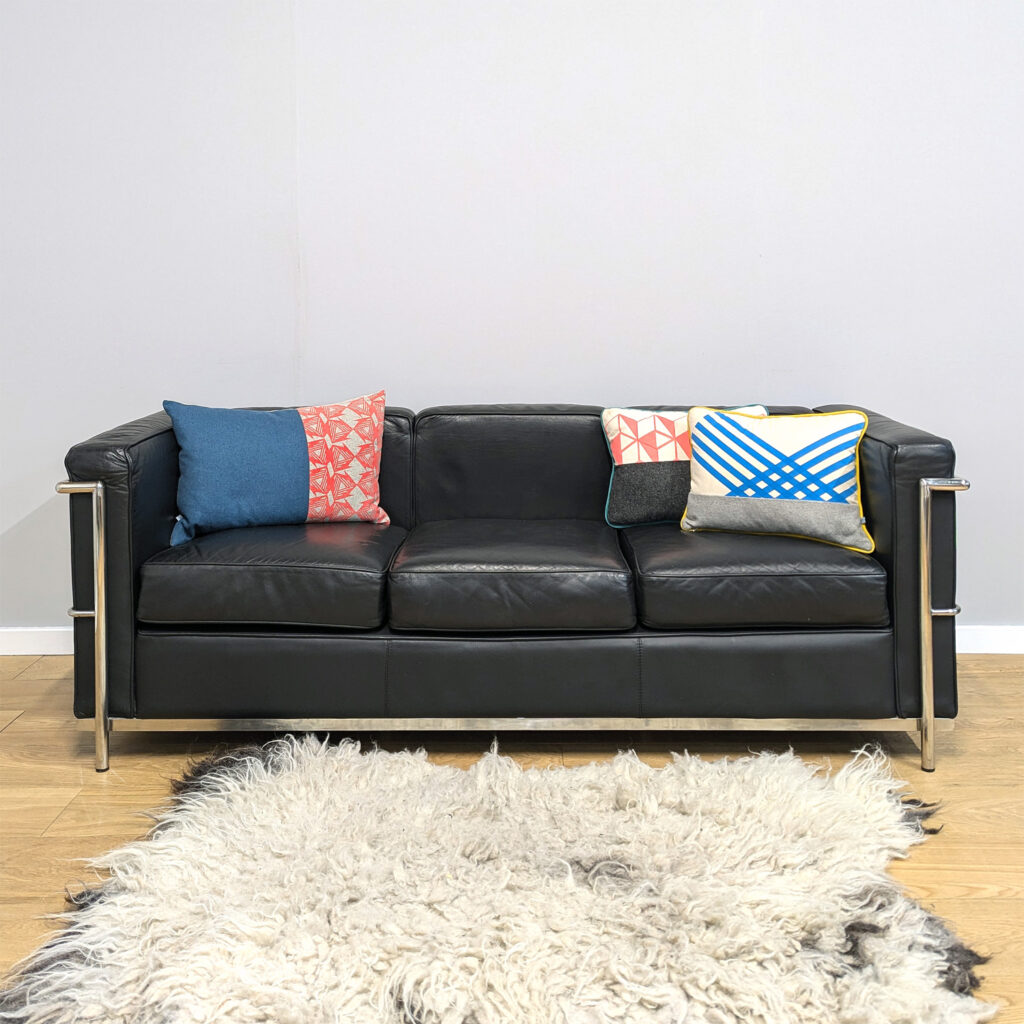 Sleek Black Leather Le Corbusier Style Sofa with Chrome Frame