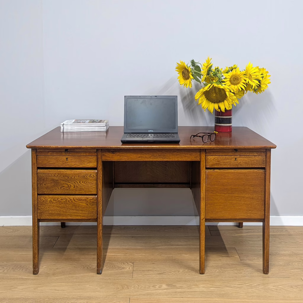 An impressive and substantial vintage desk for someone that means business. Made by COF, Carson Office Furniture, it dates from the sixties and although practicality and function have clearly been put first, the design is obviously mid century with a strong Scandinavian influence. It comes with loads of storage across five drawers with two further pull-out shelves. The desktop itself is generous and expansive. It's a little superficially knocked and scuffed here and there but the build quality on this piece is solid, robust and sturdy.   Free local delivery / Fast UK delivery / Collection welcome!